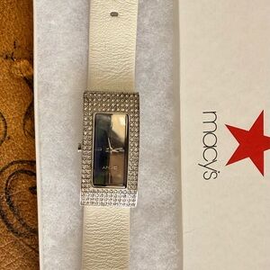 DKNY Women's Silver Crystal Watch with White Strap